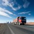 The truck driving on the highway